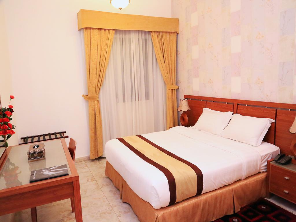 Arcadia Hotel Suites Schardscha Zimmer foto